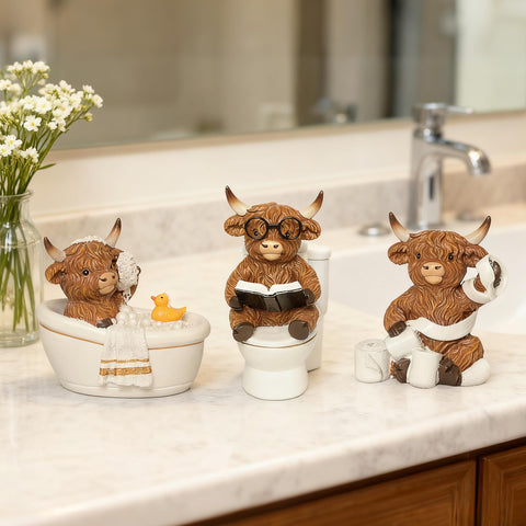 YeehaWhoo Highland Cow on toilet reading a book adds whimsical desk charm.
