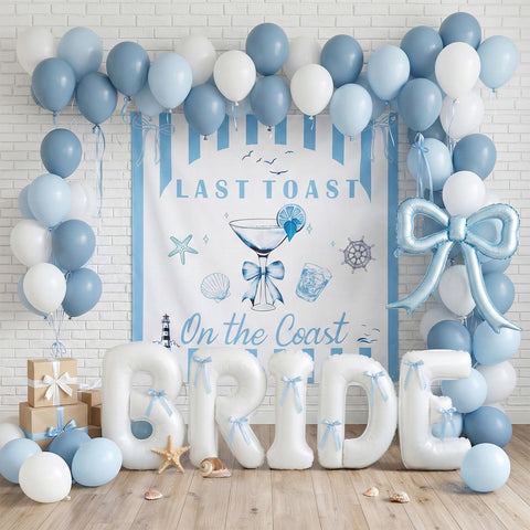 yeewaka Last Toast on the Coast balloon garland enhances seaside party photos.