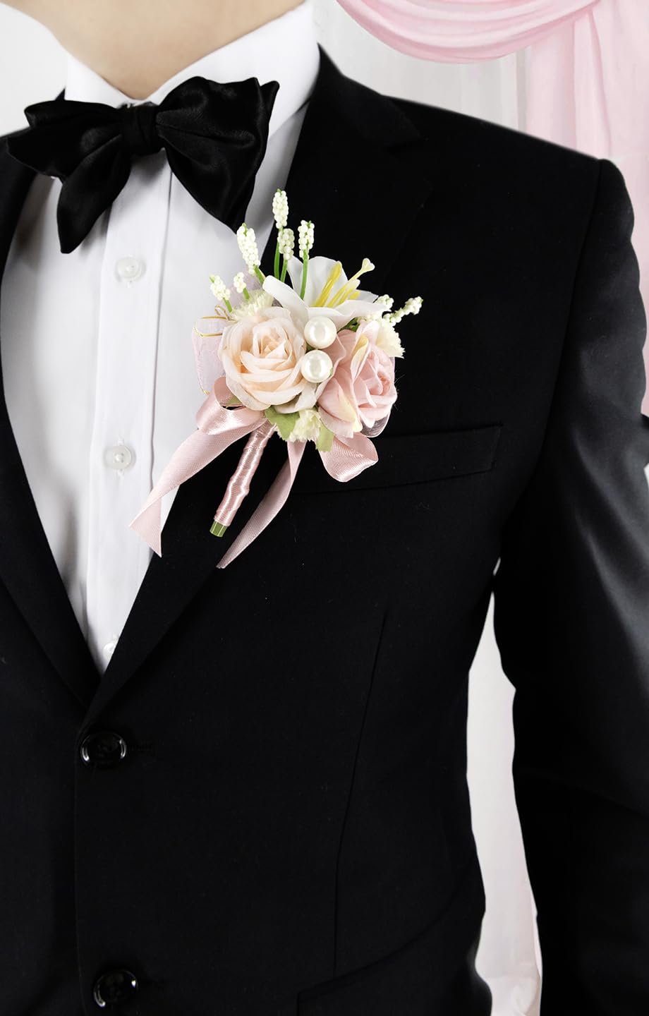 Yelinart delicate pearl embellishments elevate the corsage with a luxe look.