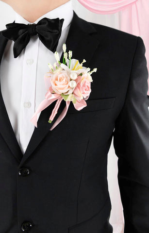 Yelinart delicate pearl embellishments elevate the corsage with a luxe look.
