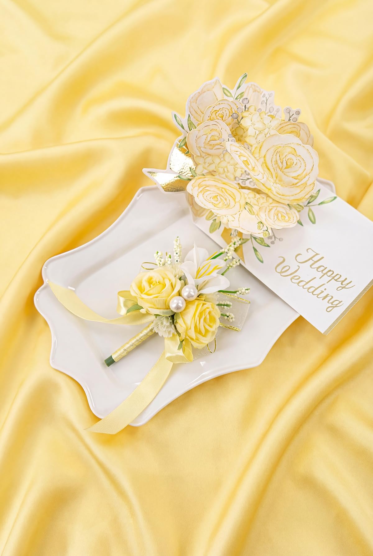 Yelinart elastic pearl bracelet holds the wrist corsage securely.