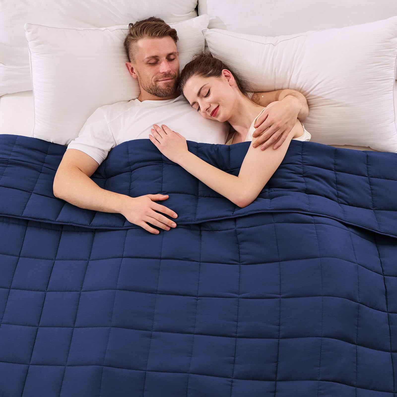 Yescool king-size weighted blanket in blue on bed for shared comfort.