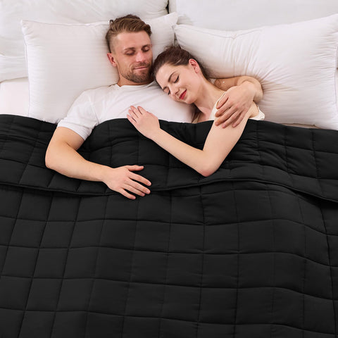 YesCool king-size weighted blanket on bed for shared sleep and even warmth.