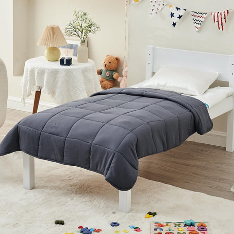 Yescool grey weighted blanket on bed for a cozy setup