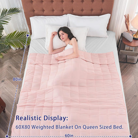 Yescool pink weighted blanket on bed blends style with cozy warmth.