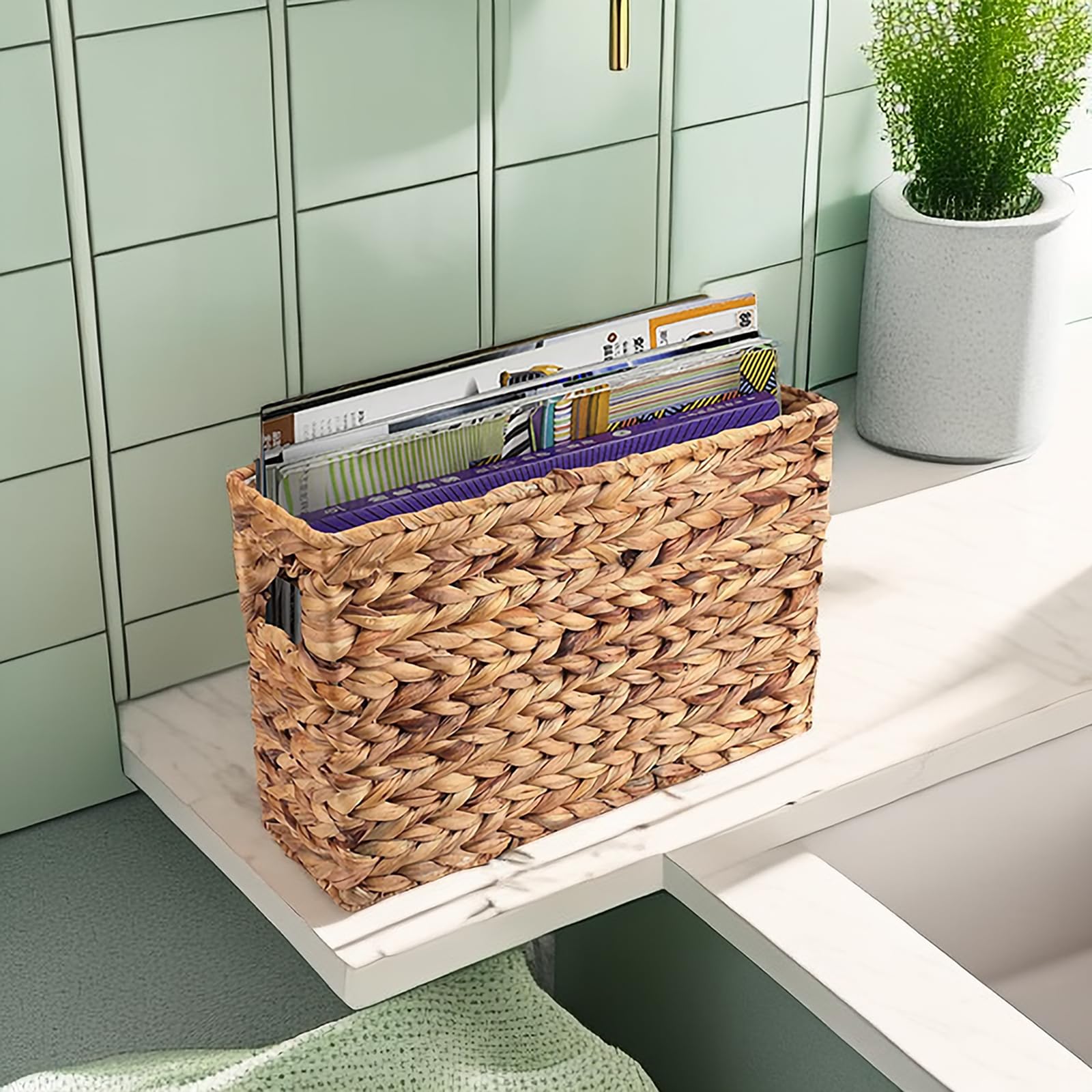 Yesland magazine basket in living room complements decor while organizing books and remotes.