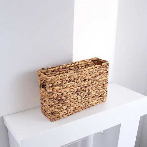 Yesland narrow wicker basket on desk keeps office essentials within reach.