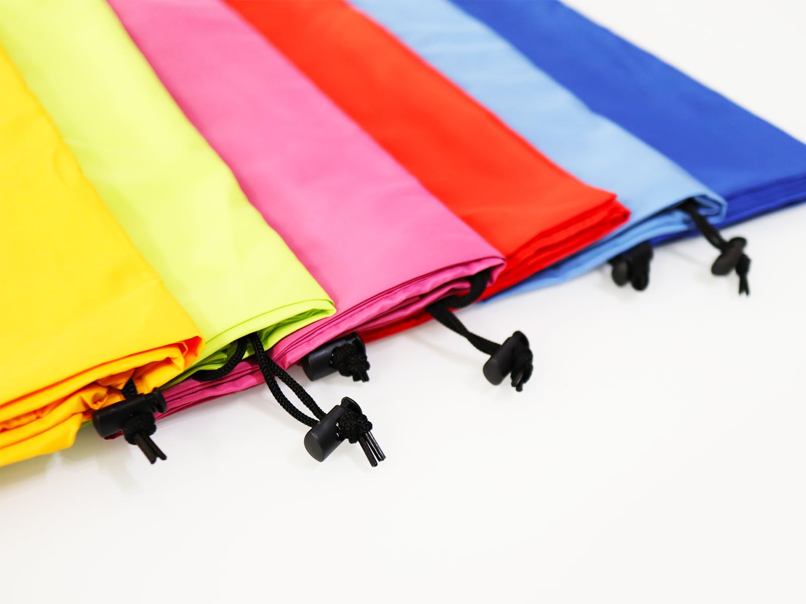 Traveler packing a YETHAN bag for easy laundromat trips.