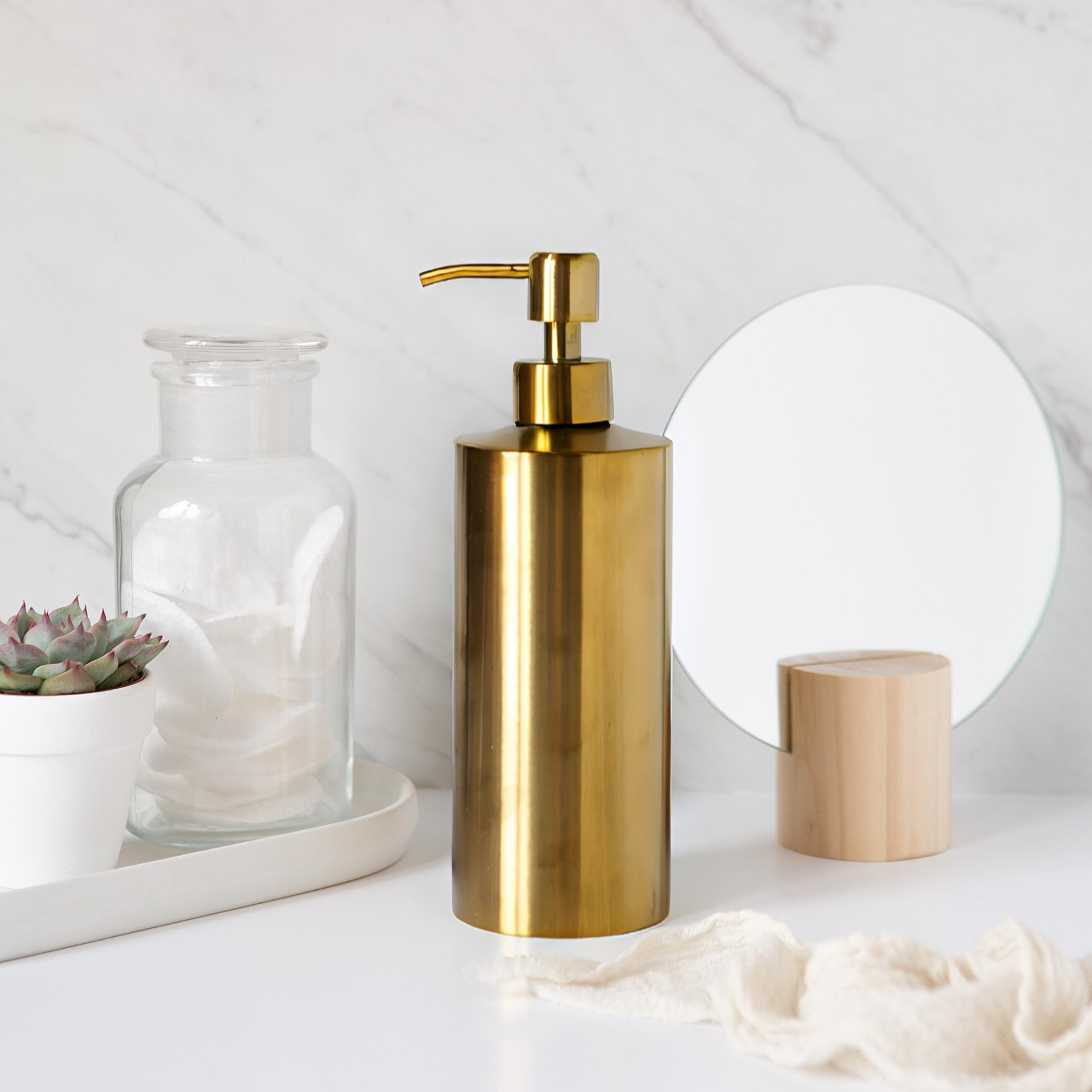 YEW DESIGN brass soap dispenser featuring protective pads prevents scratches.