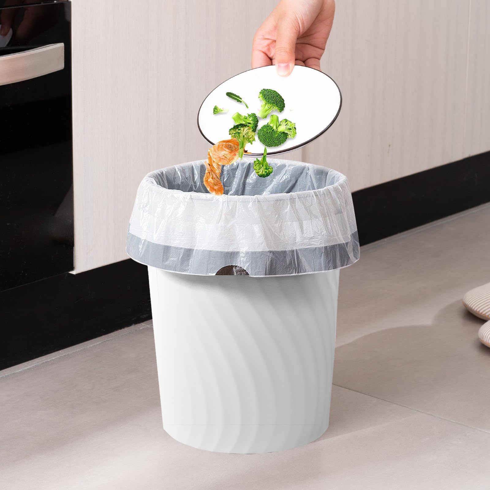 YGJT compact trash bin on desk, ideal for quick waste tasks.