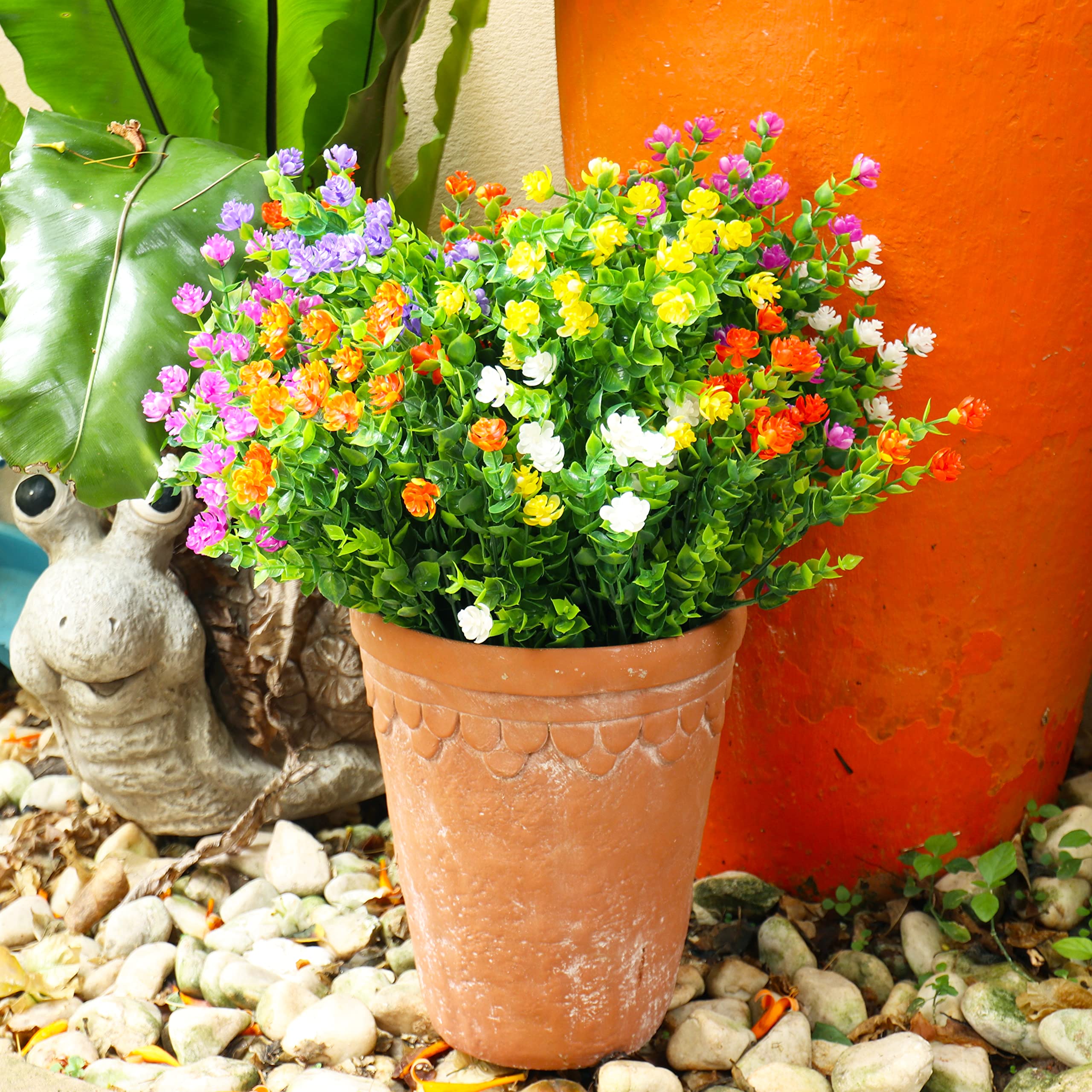 YIBUKIY weather-ready flowers resist rain and sun for lasting displays.