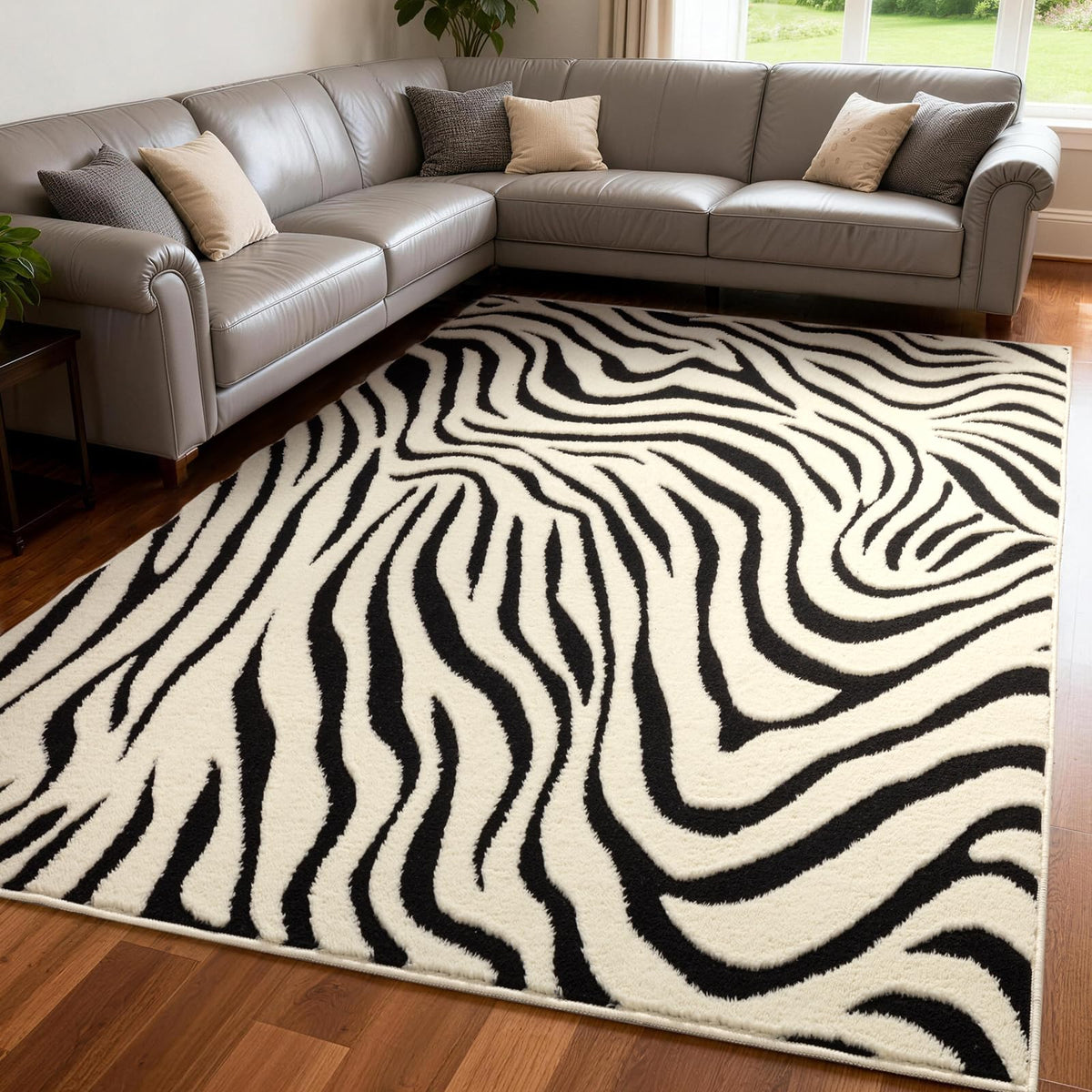 YIHOUSE 5x7 zebra-abstract rug in black and cream, ideal for chic living rooms