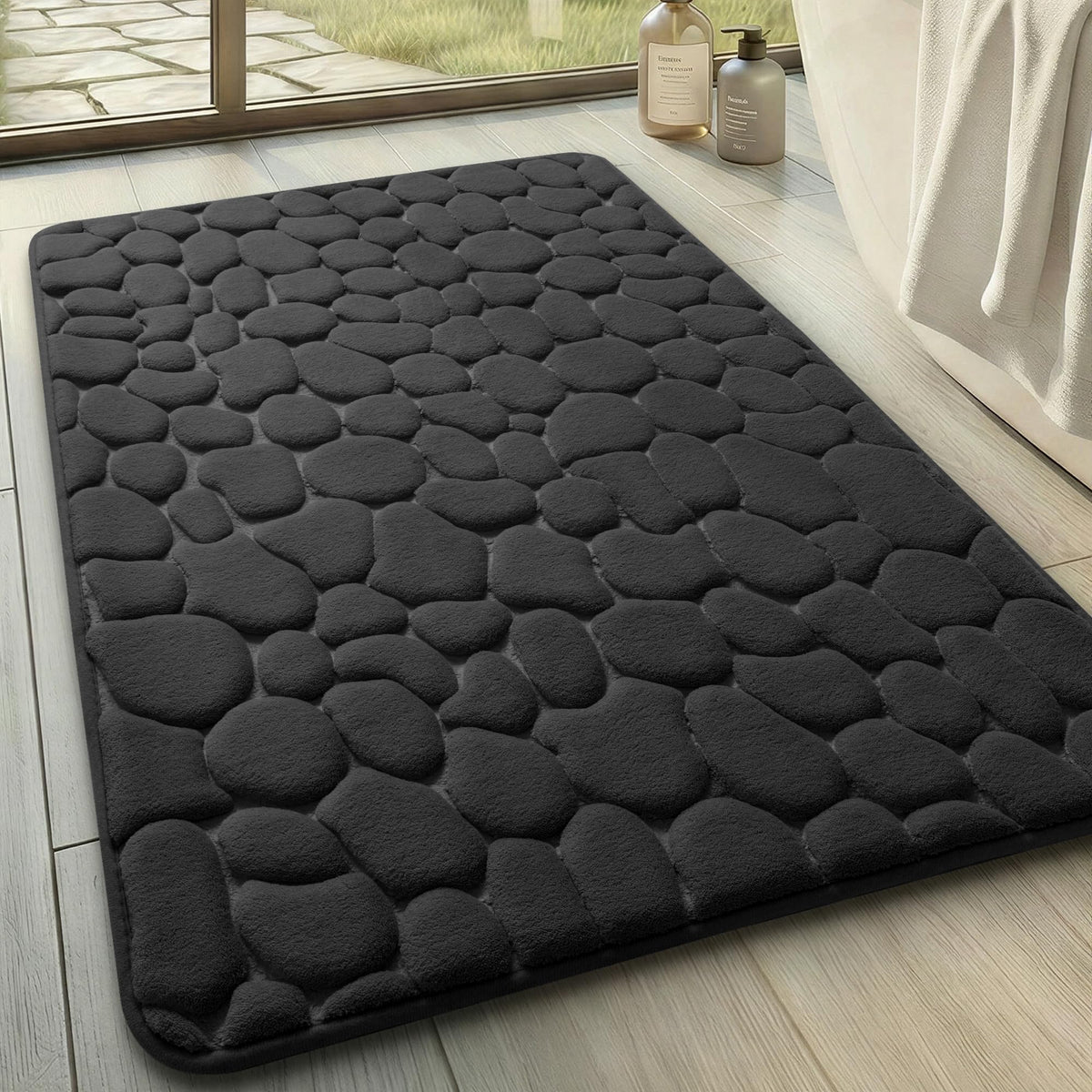 YIHOUSE memory foam bath mat with cobblestone texture cushions feet for luxurious steps.