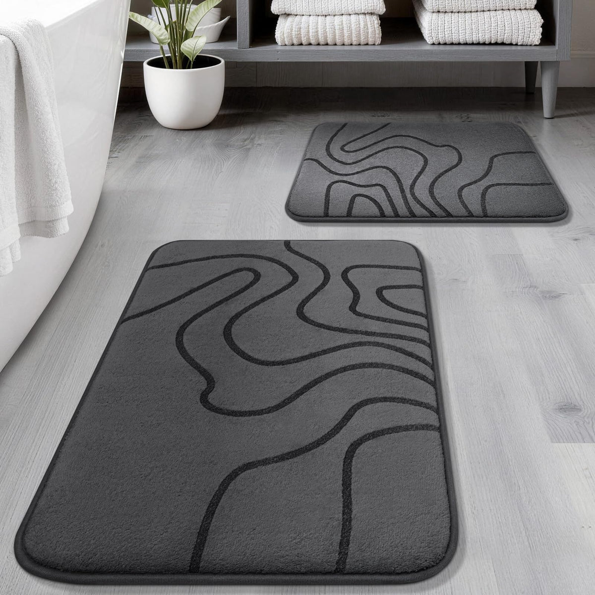 YIHOUSE memory foam bath rug with deep cushioning for soft feet after showers.