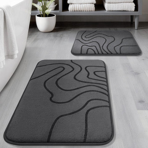 YIHOUSE memory foam bath rug with deep cushioning for soft feet after showers.