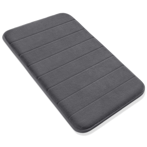 Yimobra memory-foam mat positioned in a bathroom setup with tubs and vanities.