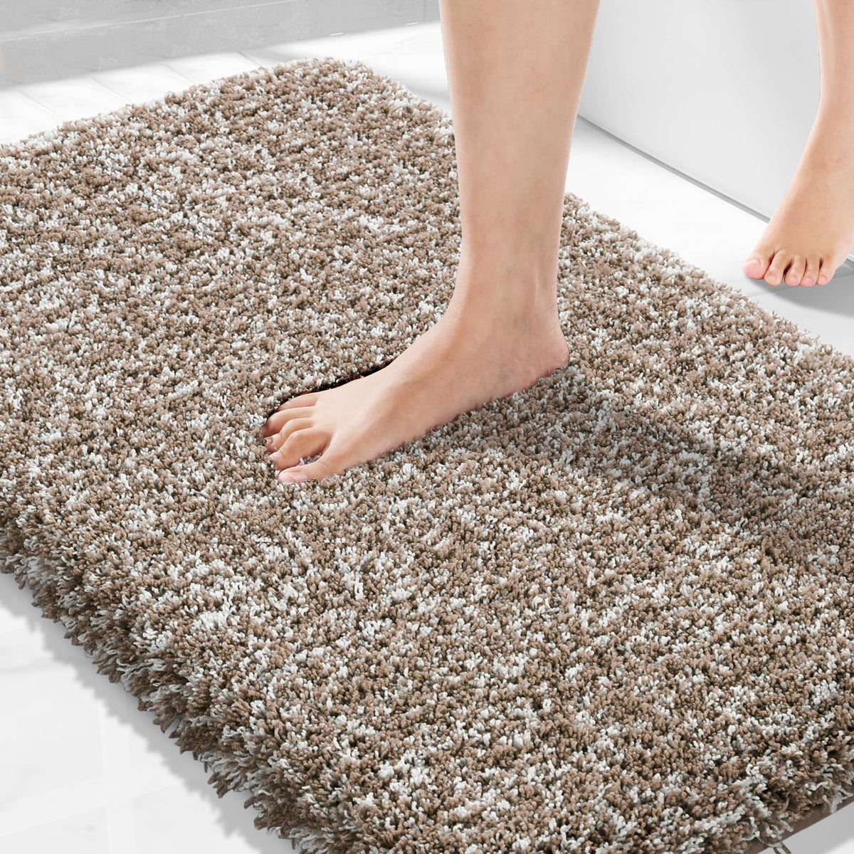 Yimobra 32x20 bath rug with ultra-soft pile for cozy post-shower feet.