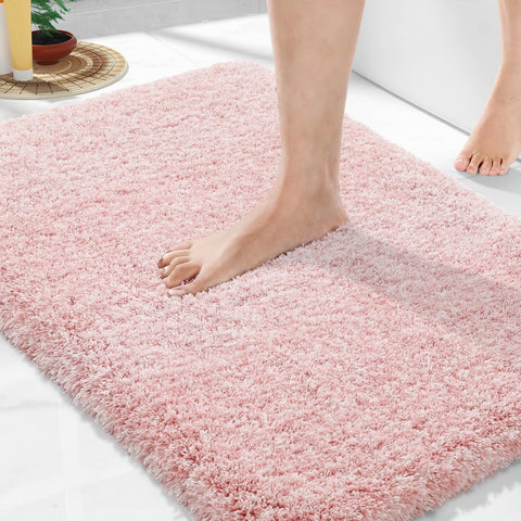 Yimobra 32x20 bath rug in plush texture provides comfort and water absorption for bathroom floors