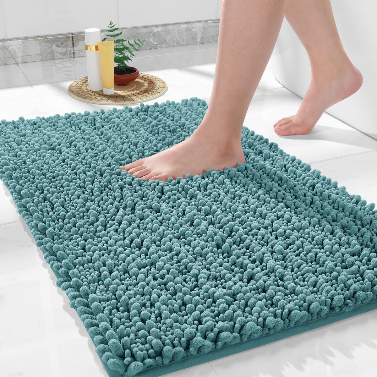 Yimobra bath rug 32x20 inch teal with non-slip backing on dry floors.