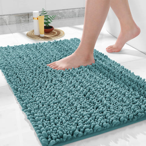 Yimobra bath rug 32x20 inch teal with non-slip backing on dry floors.