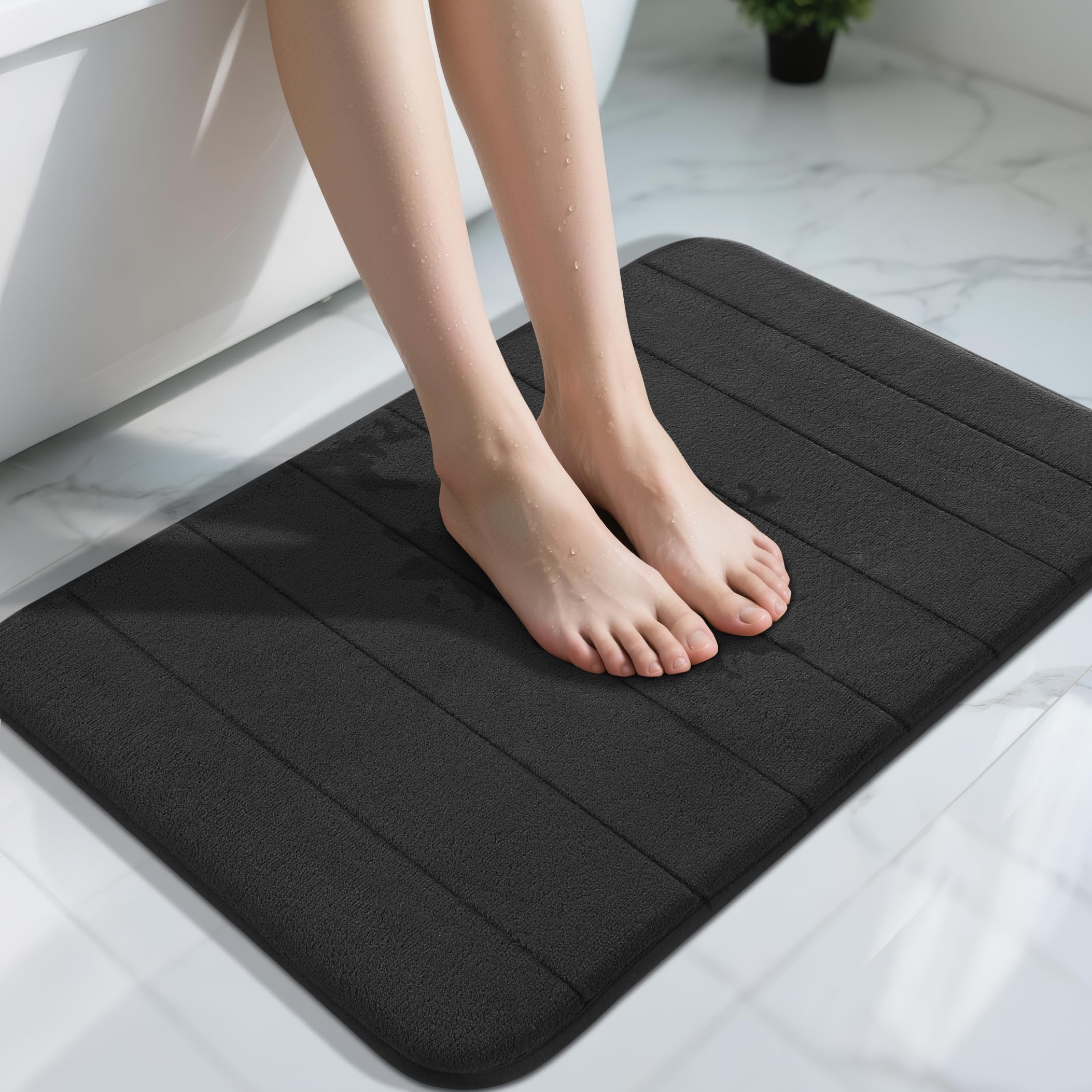 Yimobra memory foam bath mat with coral velvet top for cloud-soft comfort after shower