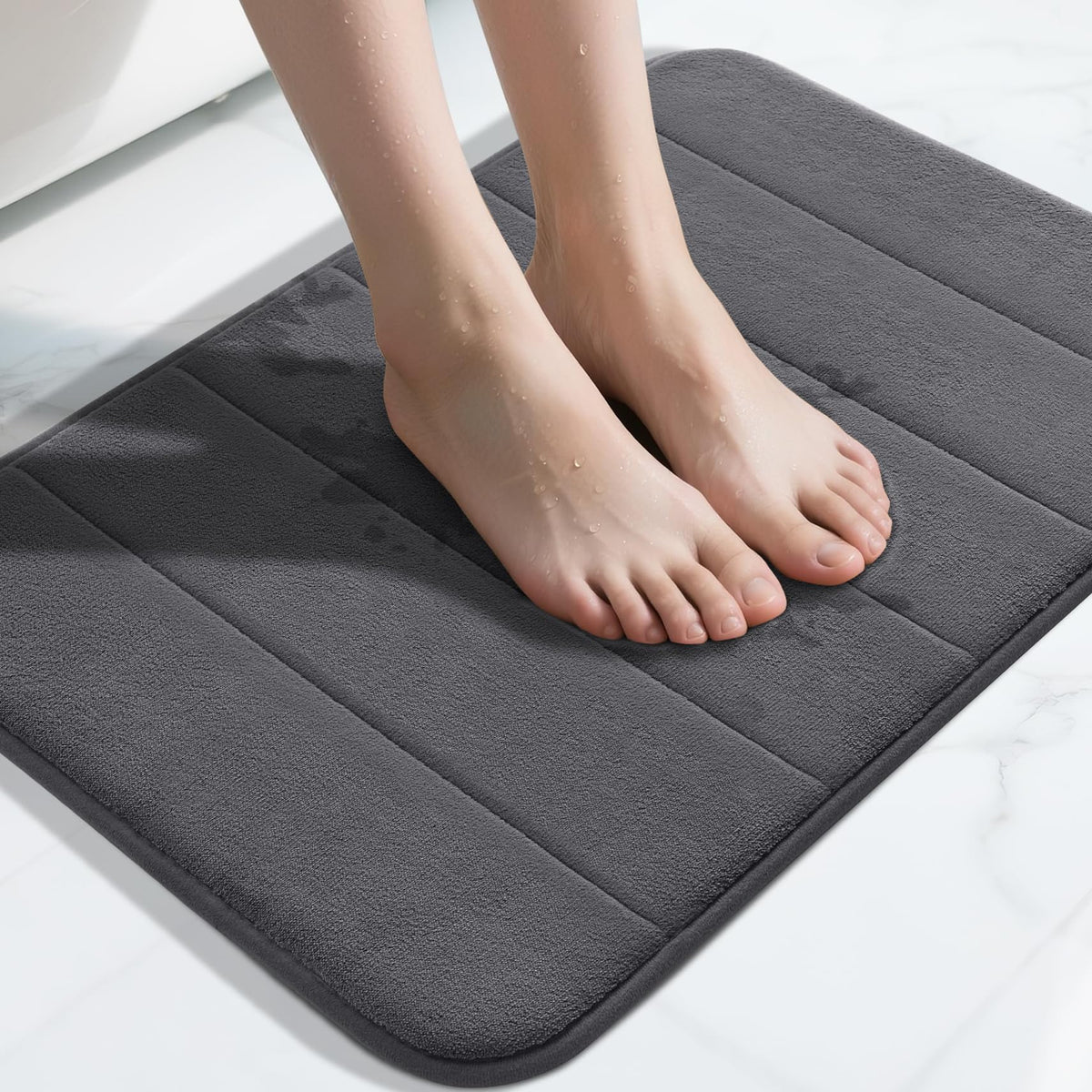 Yimobra memory foam bath mat close-up showing plush cushion for cloud-soft underfoot comfort.