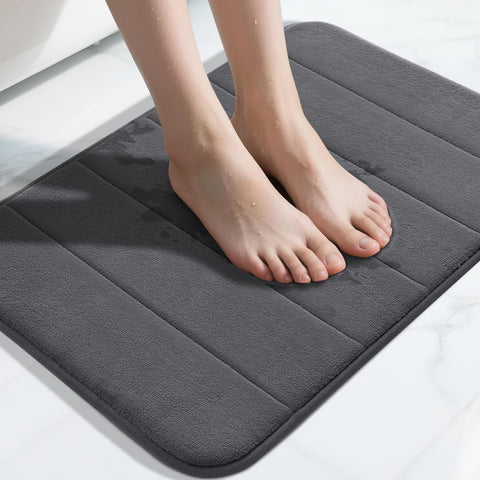 Yimobra memory foam bath mat close-up showing plush cushion for cloud-soft underfoot comfort.
