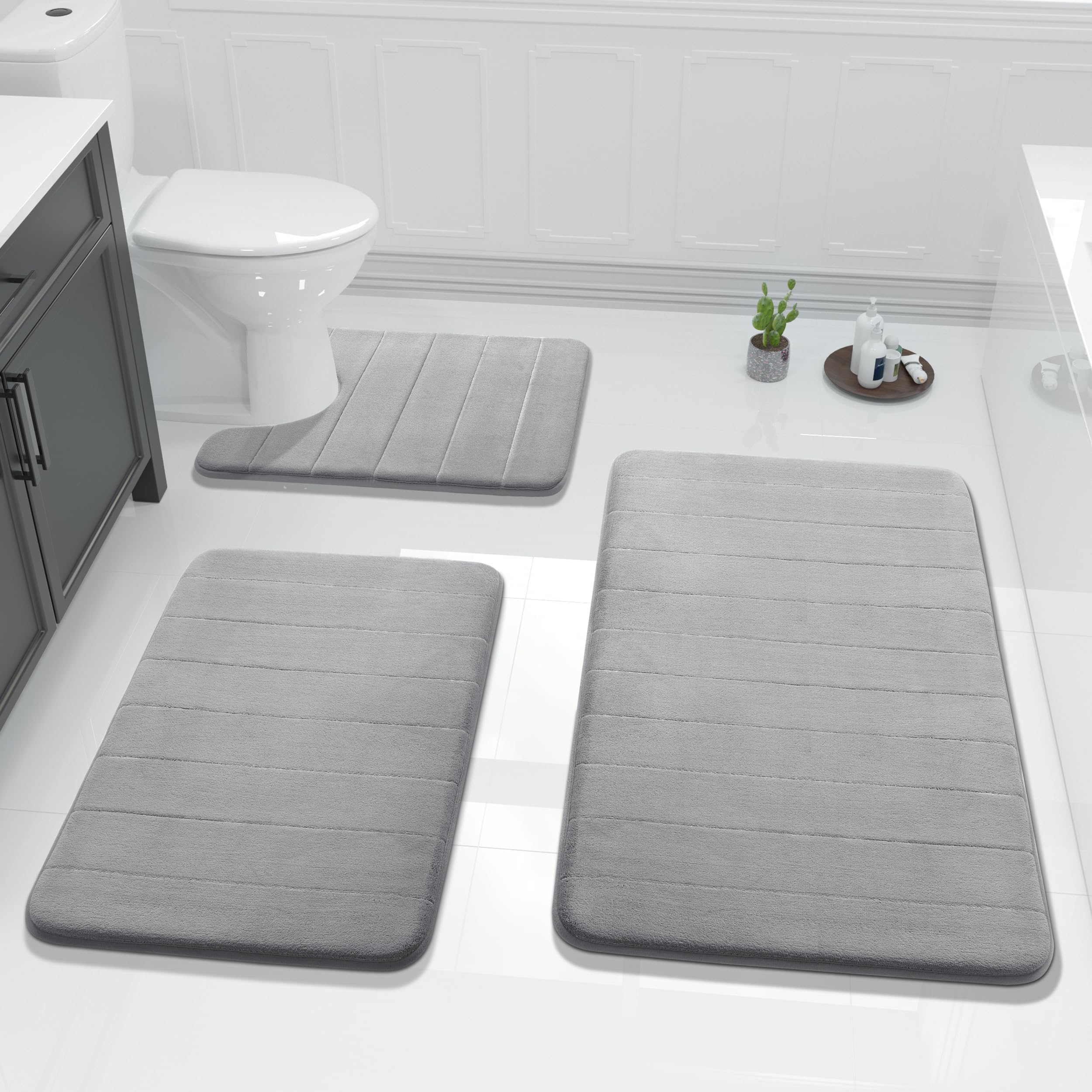 Yimobra memory foam bath mat surface in gray with plush, quick-drying comfort.