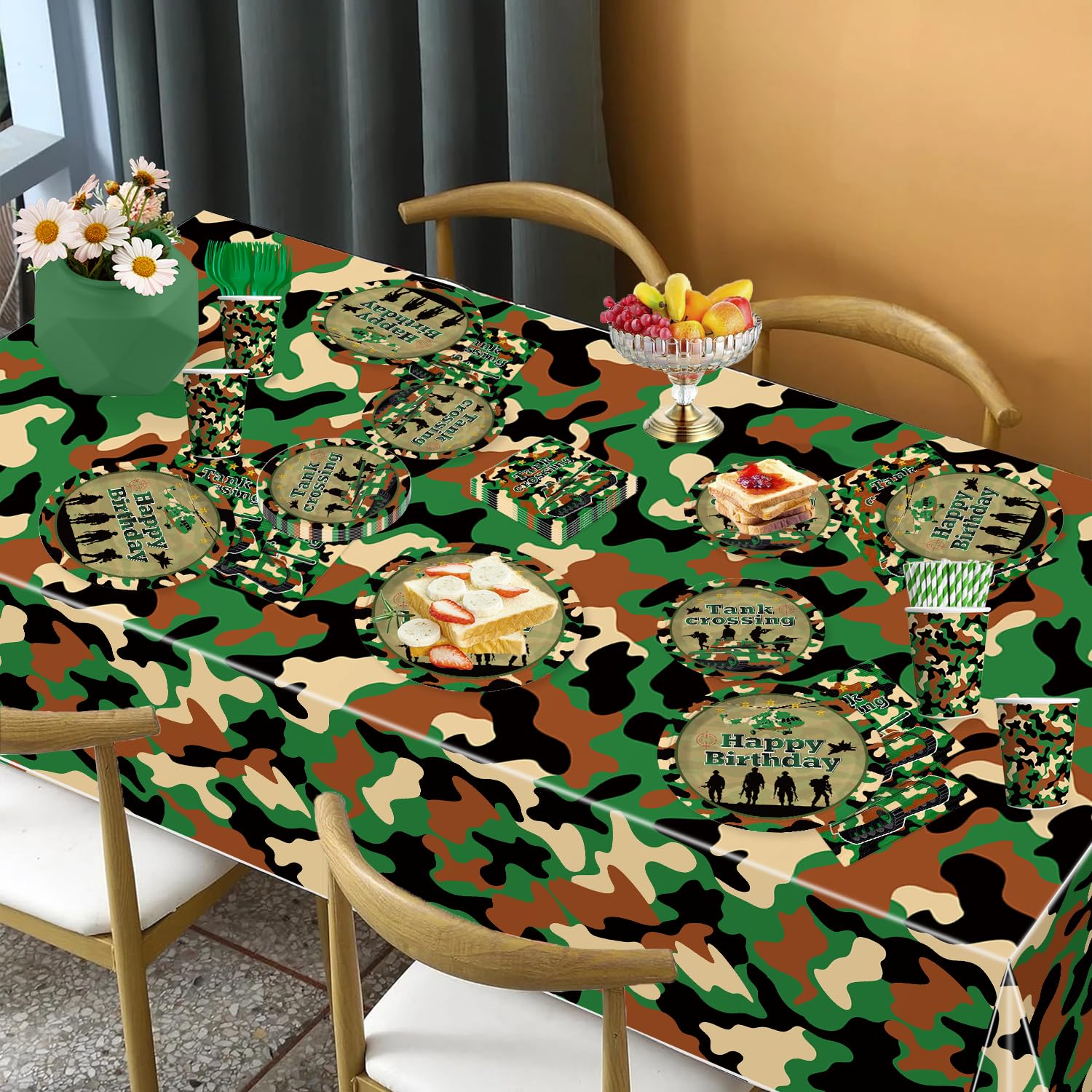 Yingoto camo tablecloth and cake topper finish the table styling with cohesion.