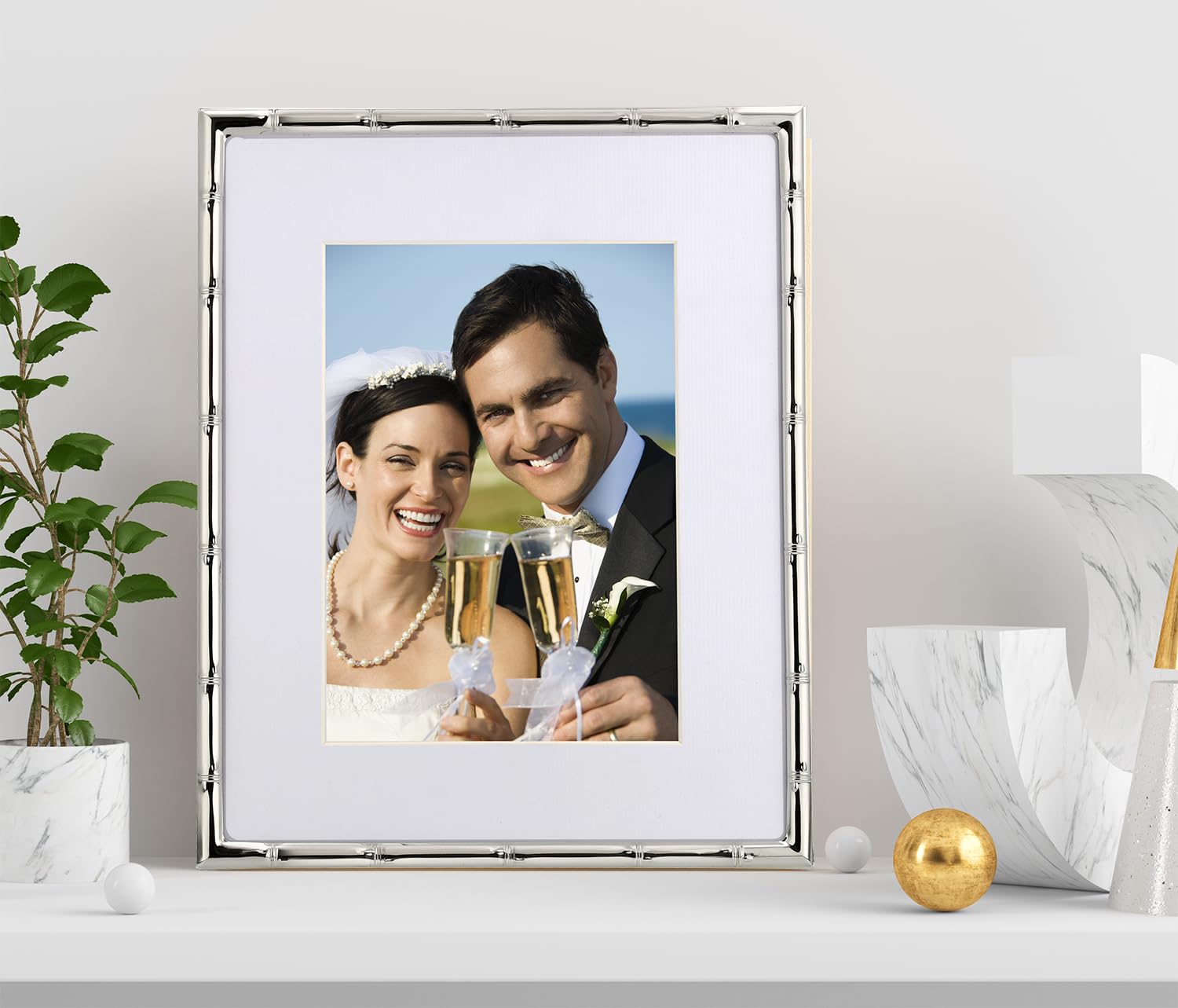 YiPinYin silver metal finish enhances décor with sturdy framing.