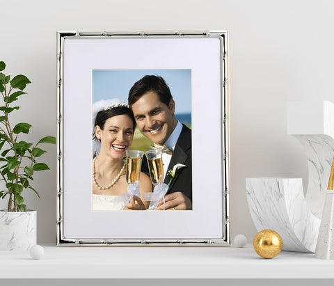 YiPinYin silver metal finish enhances décor with sturdy framing.
