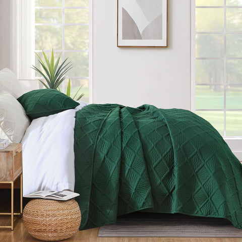 Two 20x30 pillow shams complete the Yiran emerald quilt set