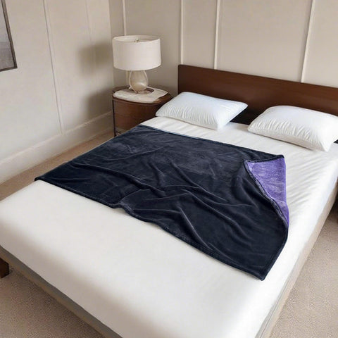 YISURE bed protector blanket in grey blocks liquids from reaching the mattress.
