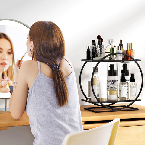 YIWANFW vanity organizer in black keeps cosmetics neatly displayed.