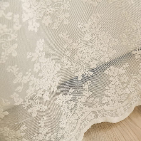 YJ YANJUN ivory lace curtain shows twelve reinforced holes for simple hanging.