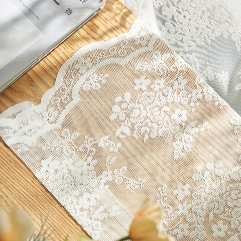 YJ YANJUN cream lace curtains provide tasteful privacy while brightening spaces.