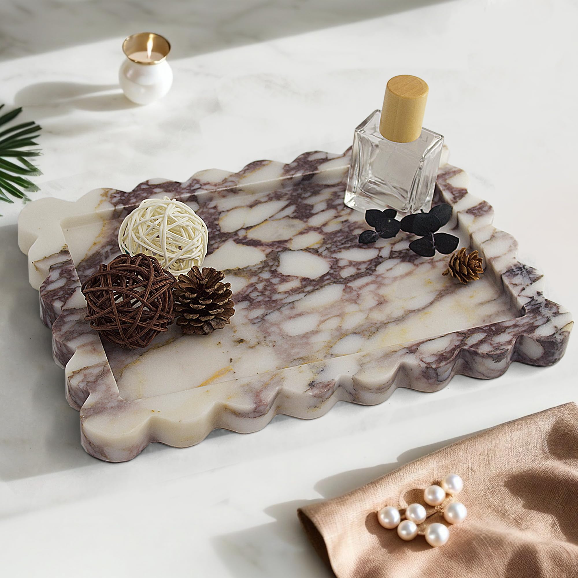 Jewelry on Calacatta Viola tray for refined display