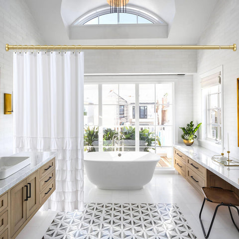 YNL Gold Shower Curtain Rod keeps curtain and liner securely in place.