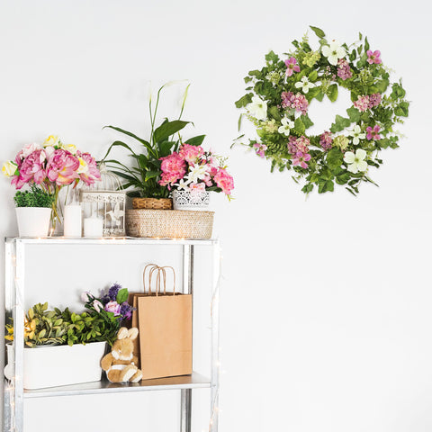 YNYLCHMX decorative greenery wreath enhances holiday or everyday home decor.