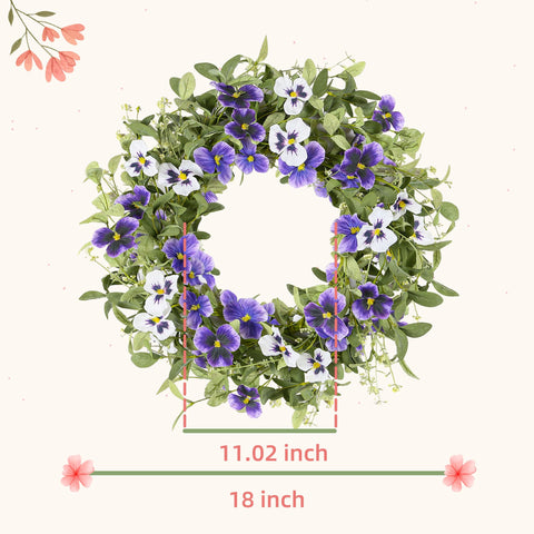 YNYLCHMX wreath close-up showing lifelike purple pansies.