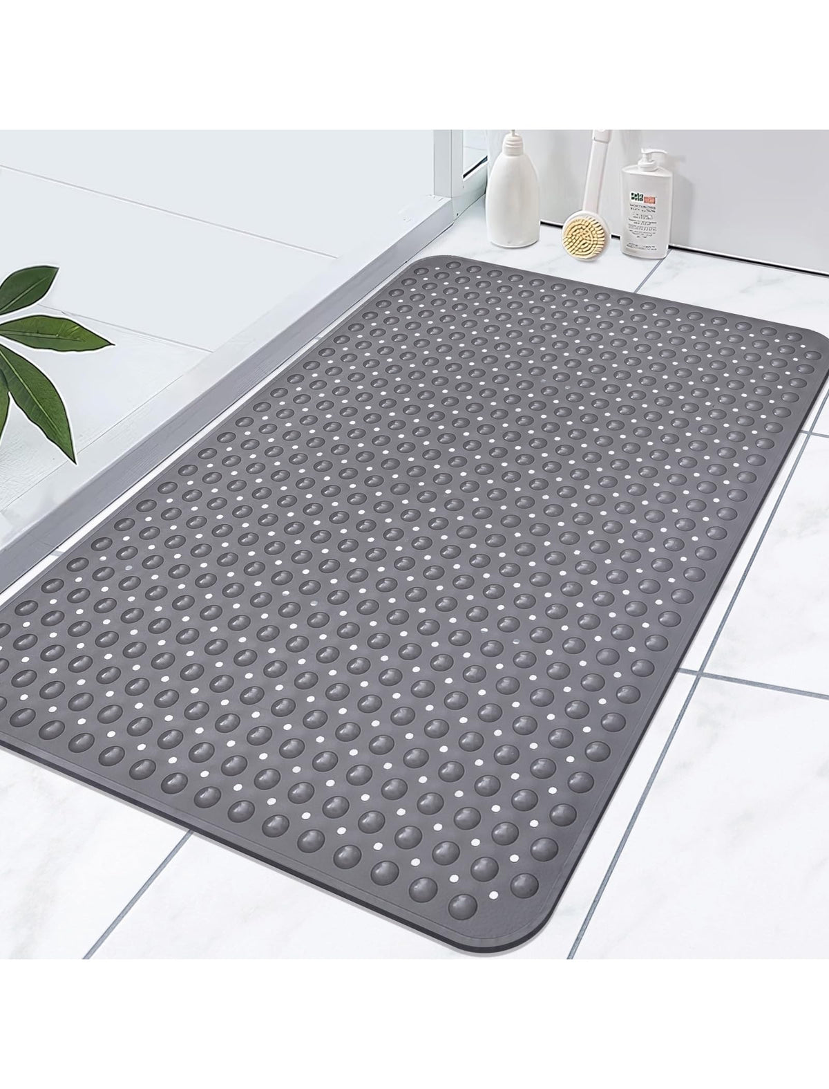 Yonala extra-large shower mat with drain hole for quick drying.