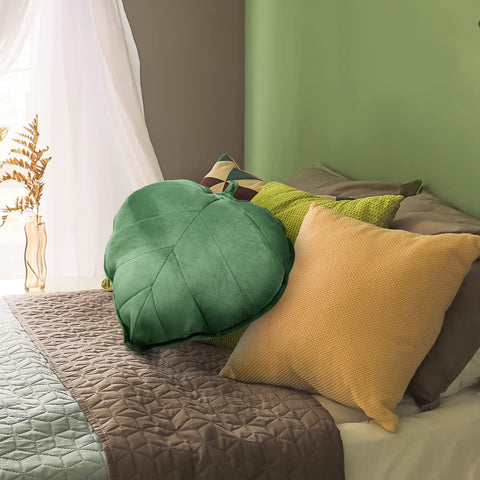 Yookeer dark green leaf pillow adds nature-inspired color to couches and beds.
