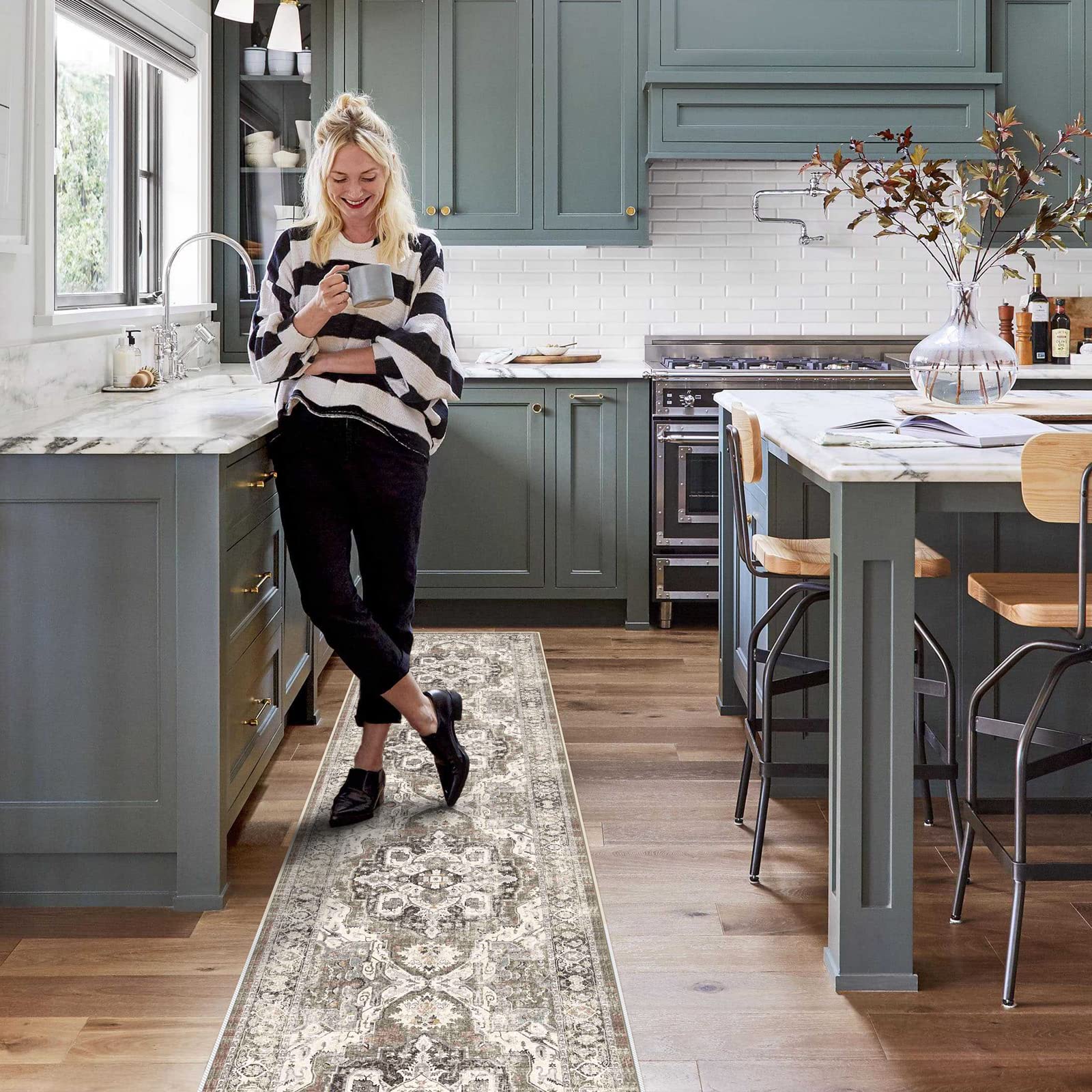 YOUFORTONG rug with rubber backing providing grip on floors.