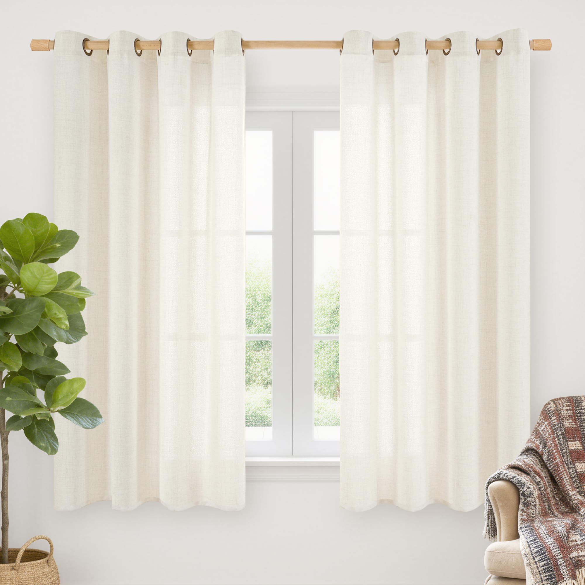 YoungsTex ivory linen curtains on living room window with bronze grommets for privacy and light diffusion.