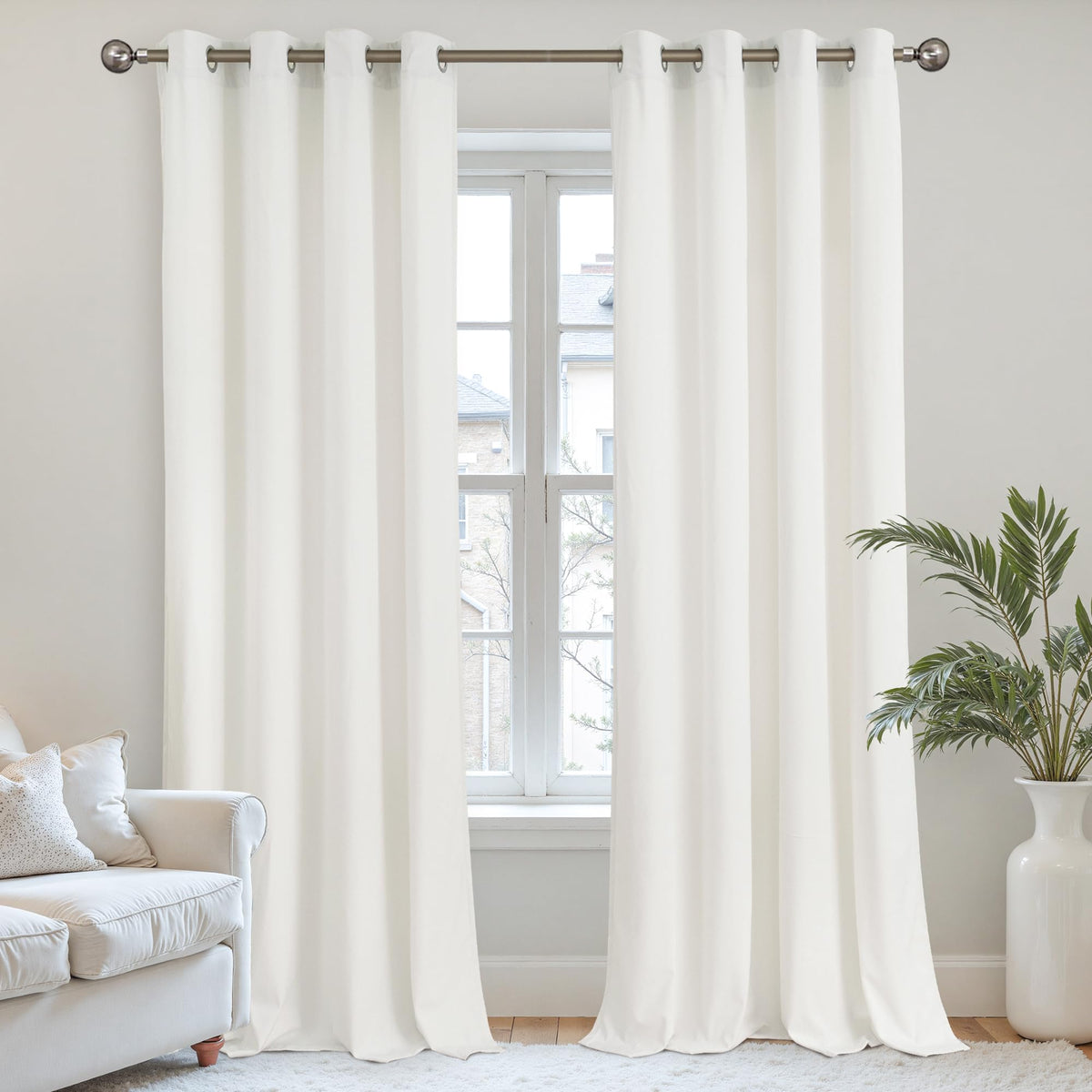YoungsTex Ivory White Velvet Curtains show folded texture for a refined living room aesthetic.