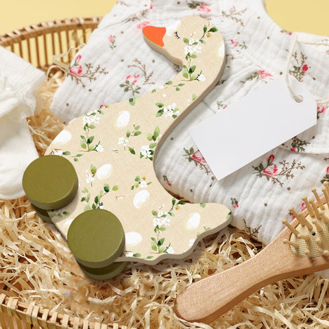 Yousoontic wooden goose decor features floral prints elevating baby shower tables.