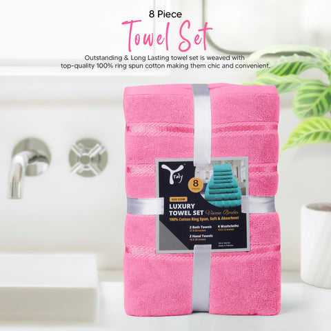 YRALY pink towels bring decorative warmth to the bathroom.