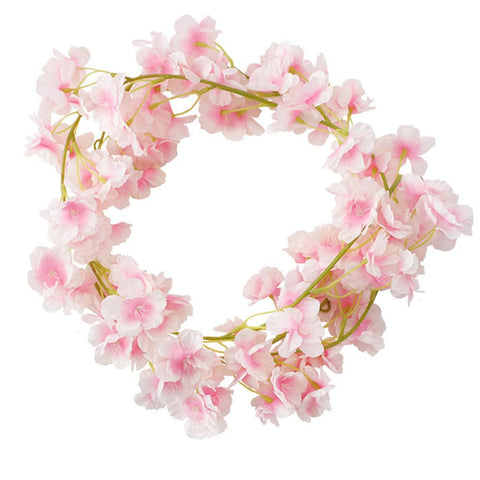 YRIOWMI cherry blossom garland as a photo backdrop with realistic detail