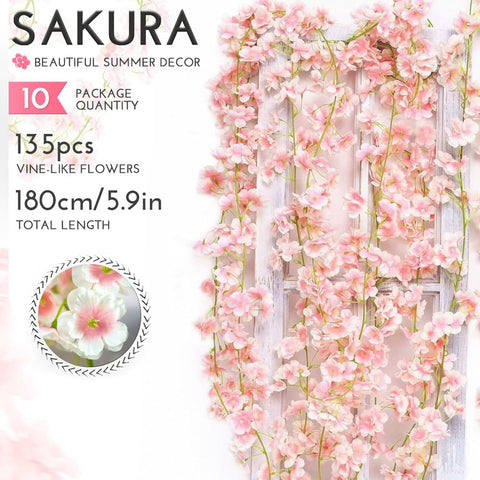 YRIOWMI cherry blossom garland used as a wedding backdrop with gradient petals