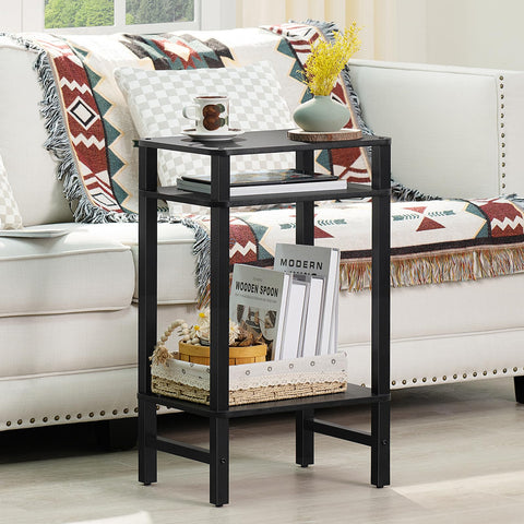 YUFAM in a living room setup beside a sofa for convenient surface area.